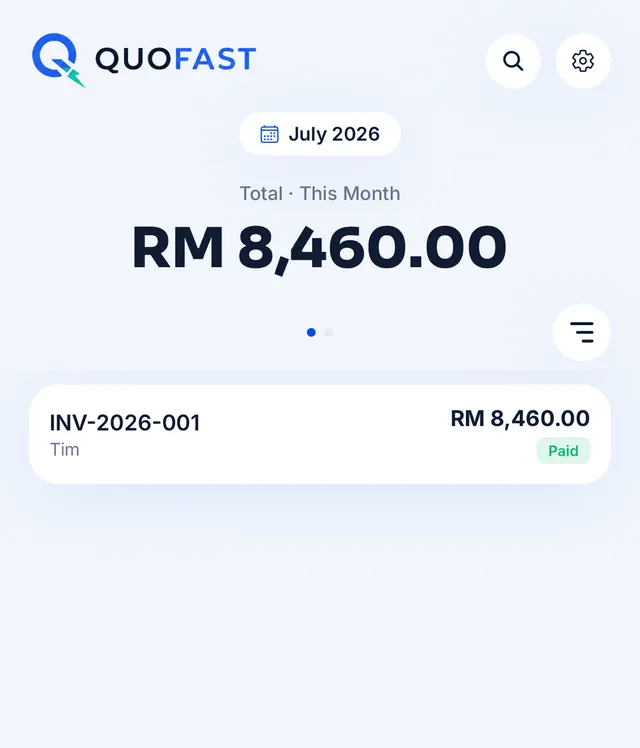 Invoice list showing this month’s total and a paid invoice
